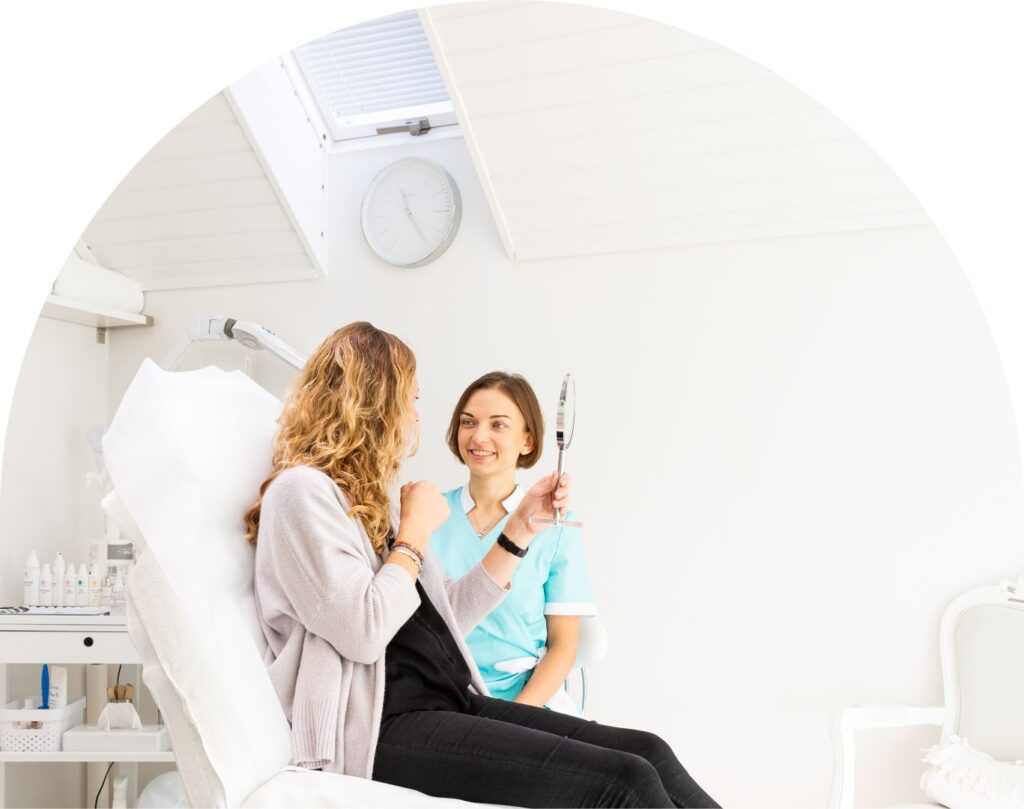 skin-treatment-results-patient-looking-in-mirror.